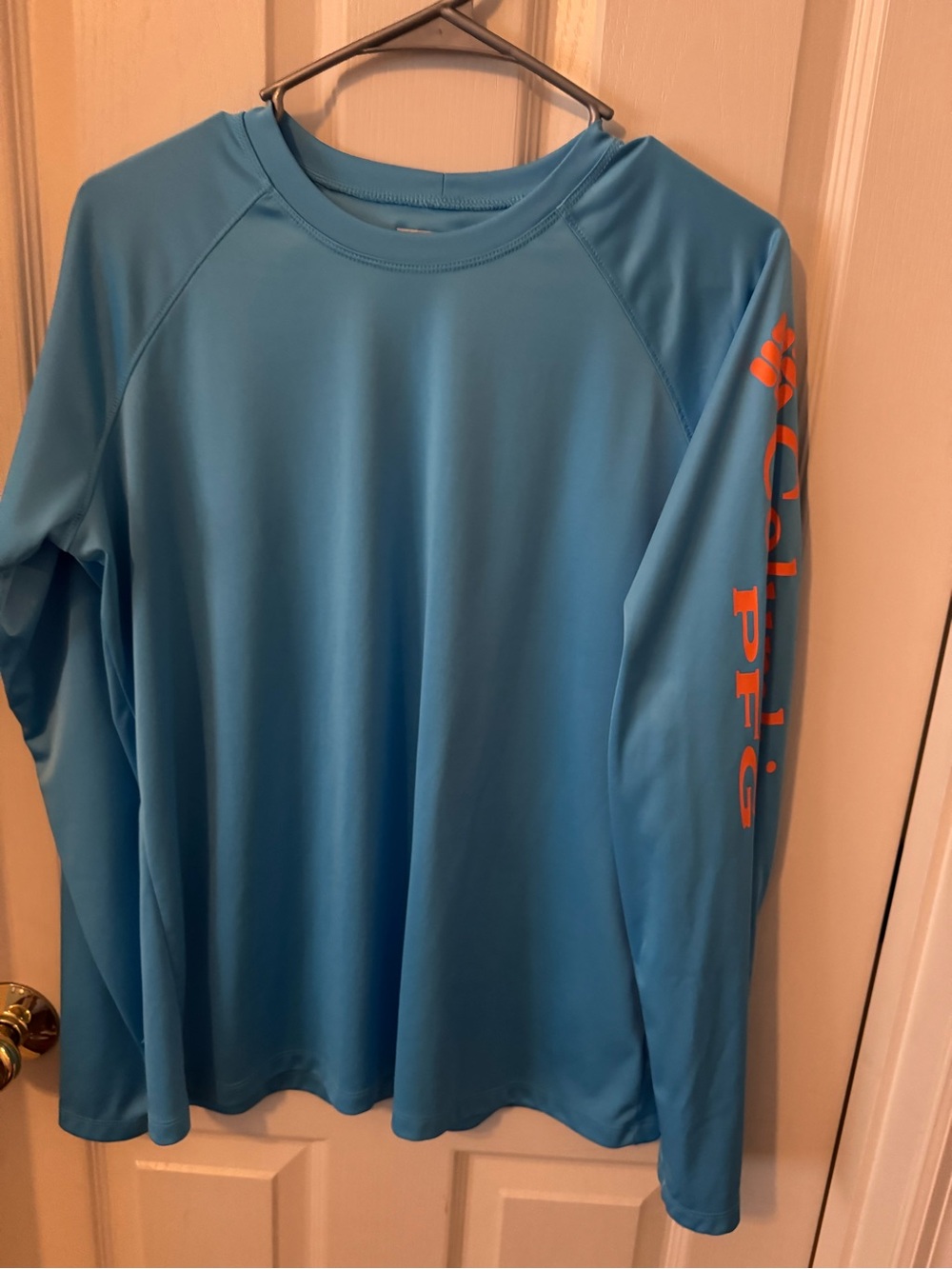 Columbia Blue Long Sleeve PFG Shirt with Orange Sleeve Logo